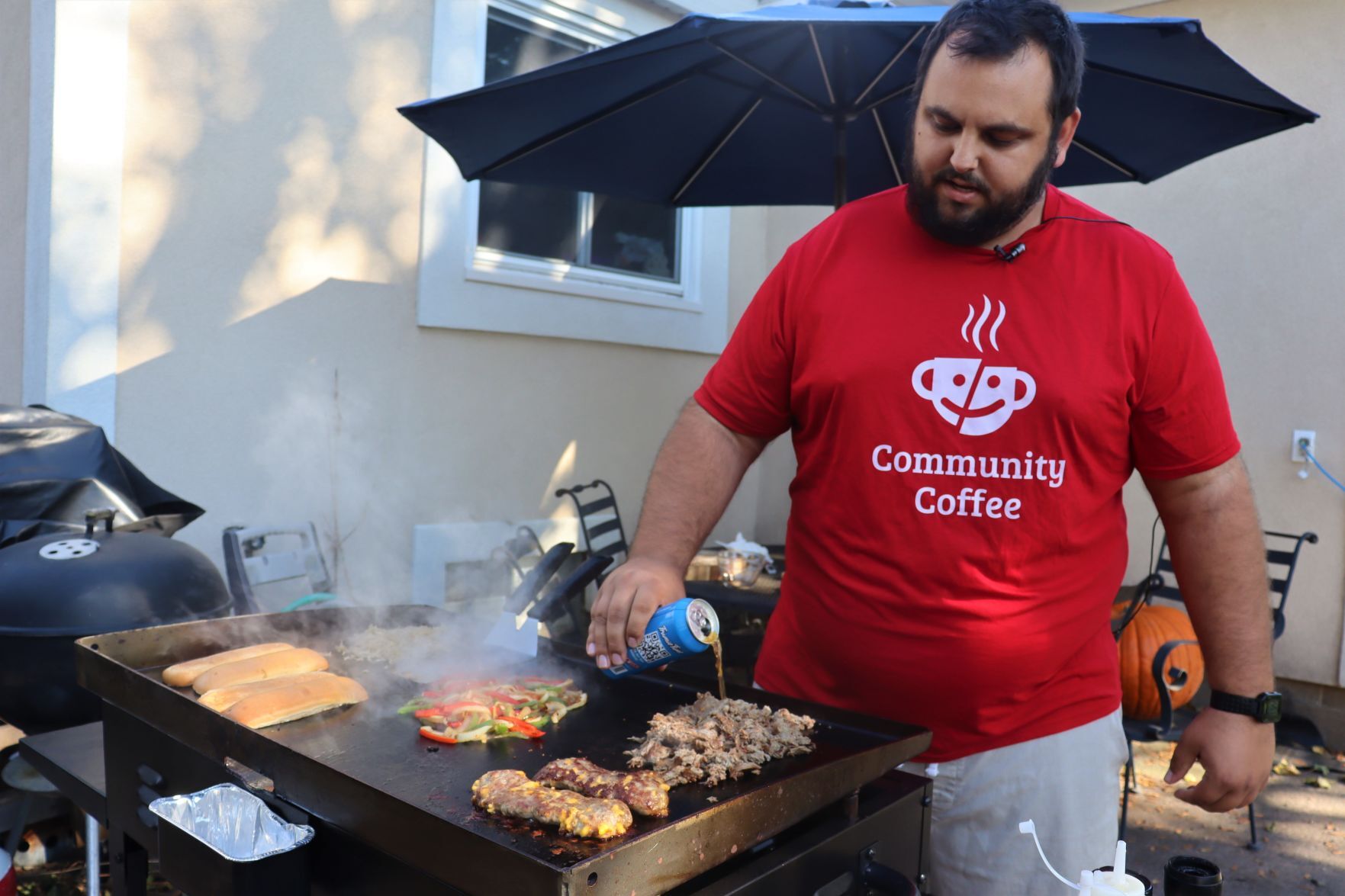 Blake Sykora preparing a Wisconsin cheese steak